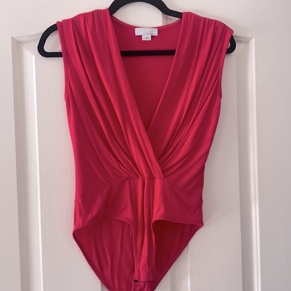 Not my favorite color on me! Hot pink bodysuit